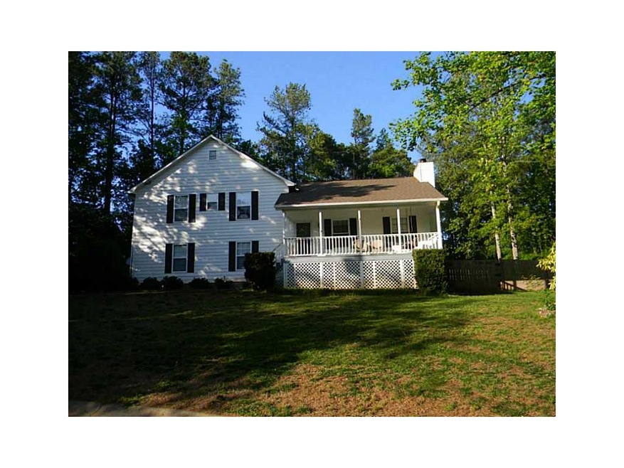 Exterior Front. 4 bedroom home onLarge level lot, 