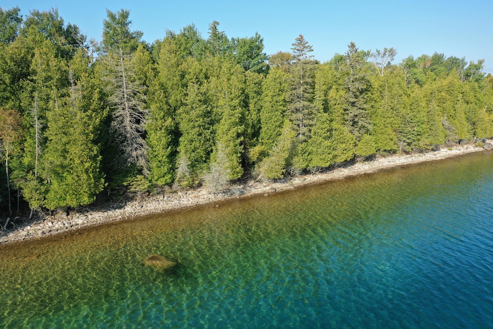 A S Crow Point Ln, Clark Township, MI 49719 - photo 1