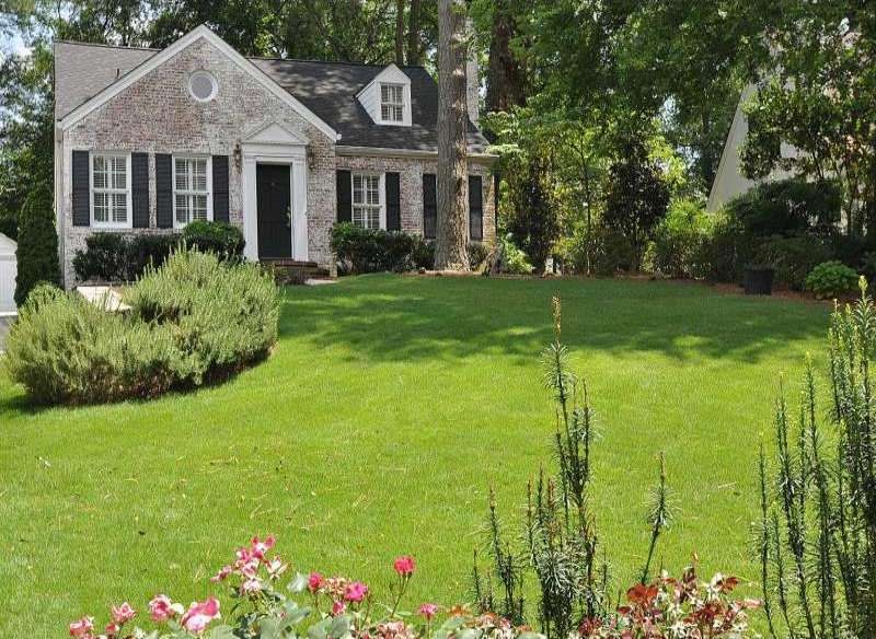 Exterior Front. Classic sandblasted brick charmer 