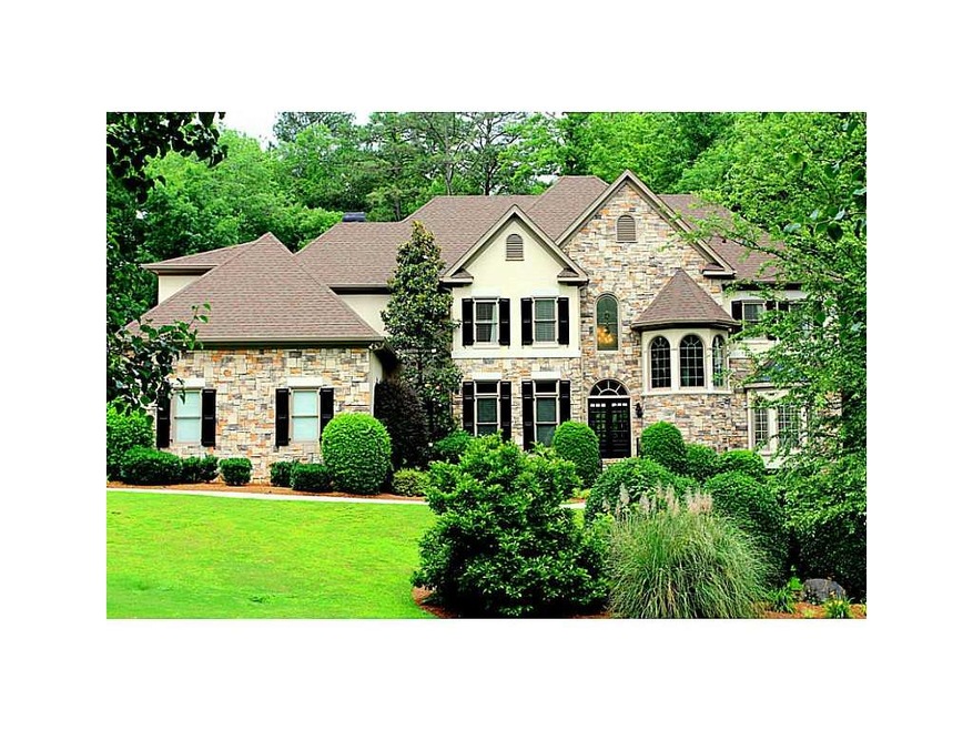 Exterior Front. Hardcoat Stucco and Stone Traditio