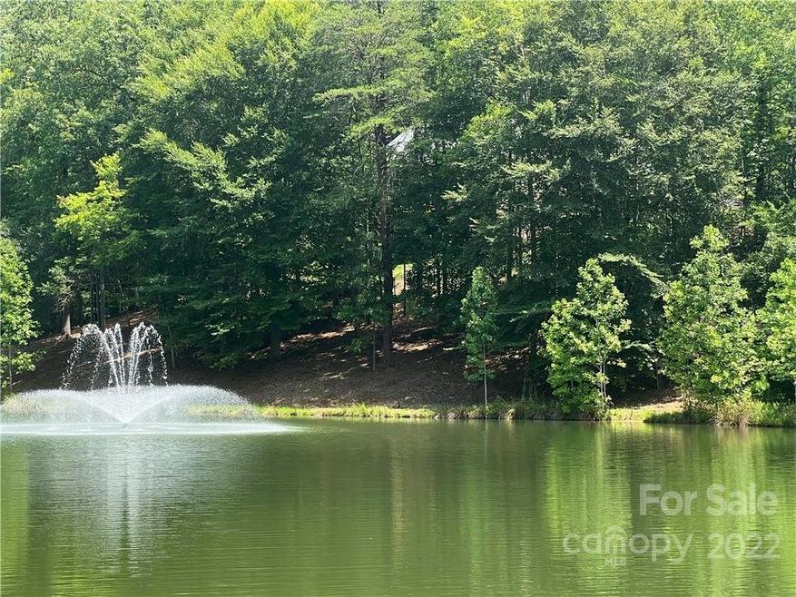 View of lot from across private pond