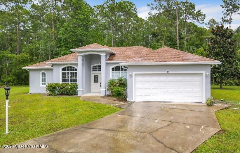 27 Utide Ct, Palm Coast, FL 32164 - photo 1