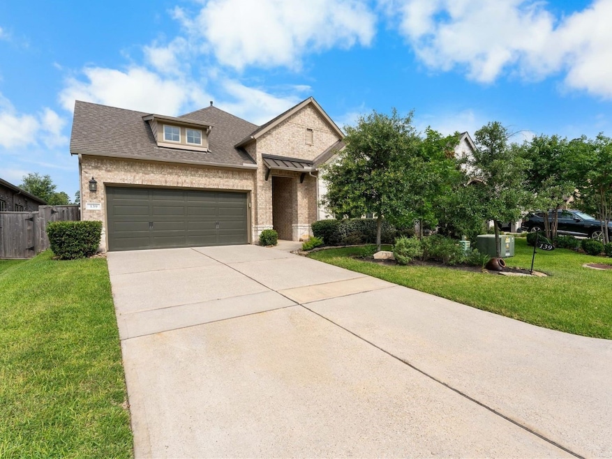 Beautiful curb appeal with well-maintained landsca