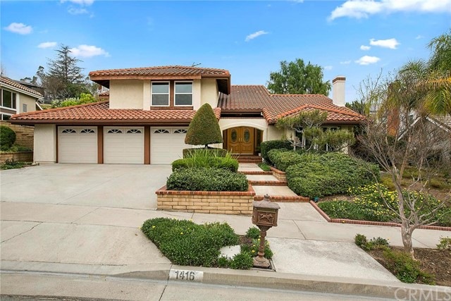 Desirable Spanish style two-story home on a privat