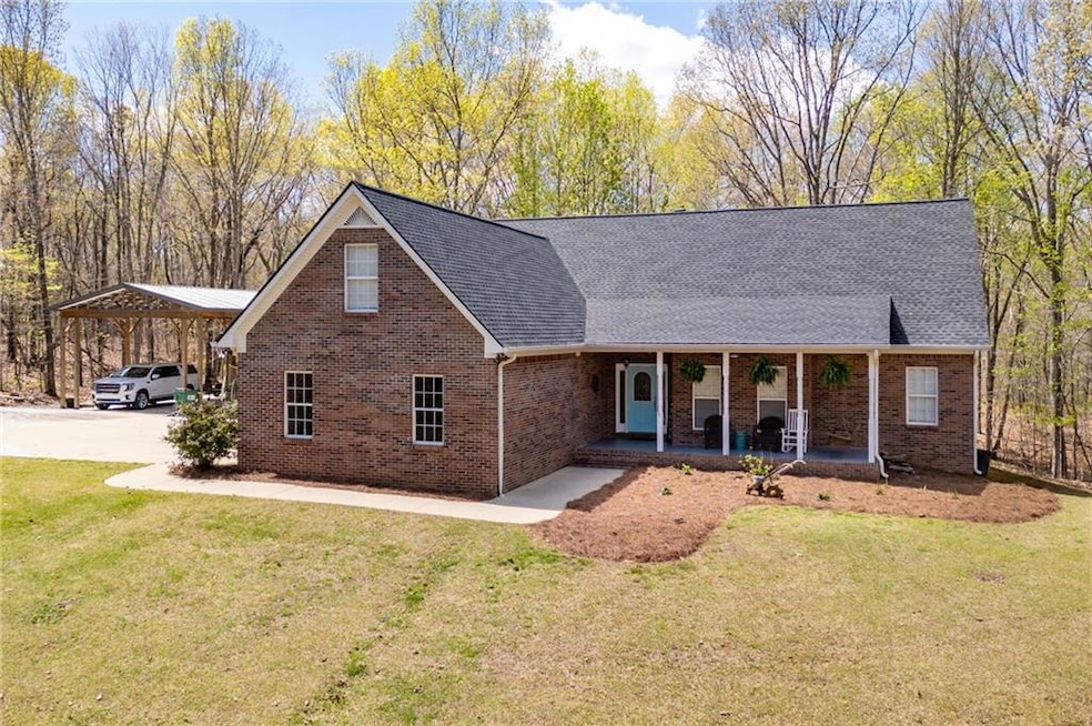 View of front of property featuring covered porch,