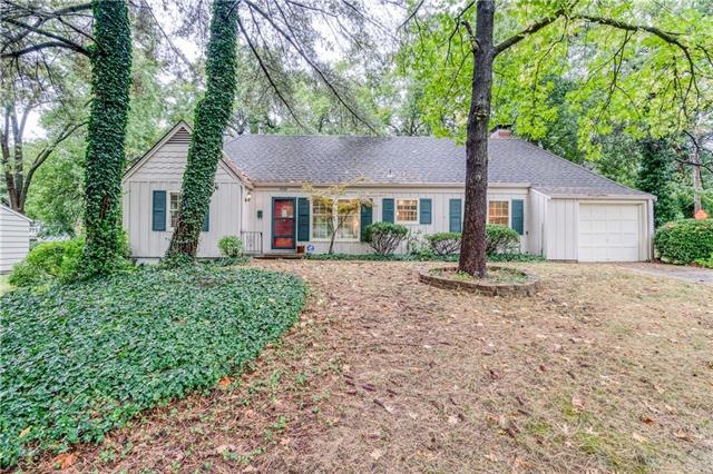 House sits on .28 acre treed corner lot.