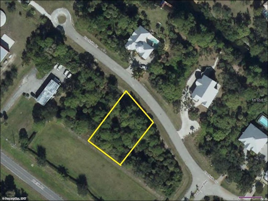 APPROX. 1/2 ACRE LOT NESTLED IN THE PRIVATE GATED 