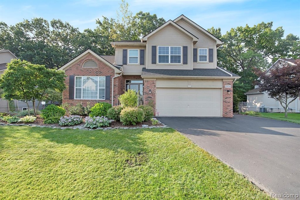 4 bedroom colonial with extra wide driveway