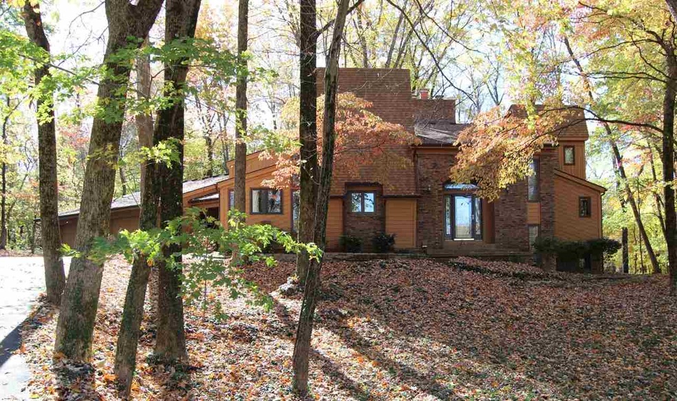 Breathtaking views surround this 4-bedroom, 3.5-ba