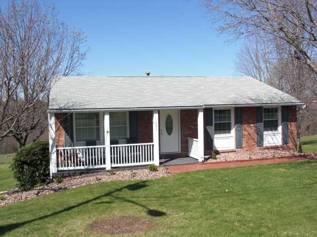 Exterior Front. New Front Door, Shutters, and Rail