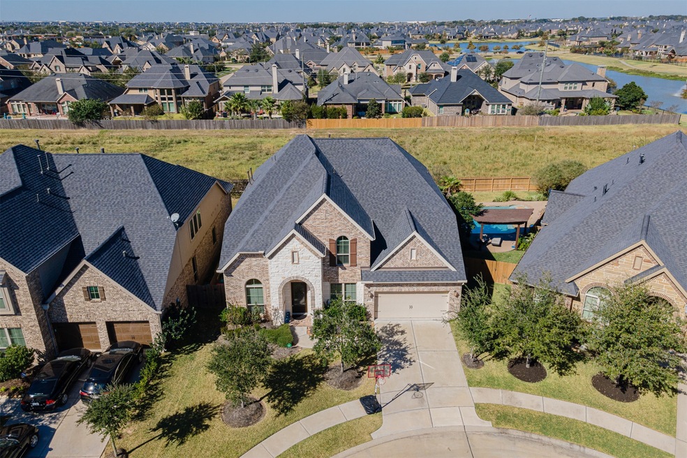 This beautiful Perry home has 5 bedrooms, 4.5 baths, office, formal dining and a large game room.  Located on a greenbelt with no back neighbors.