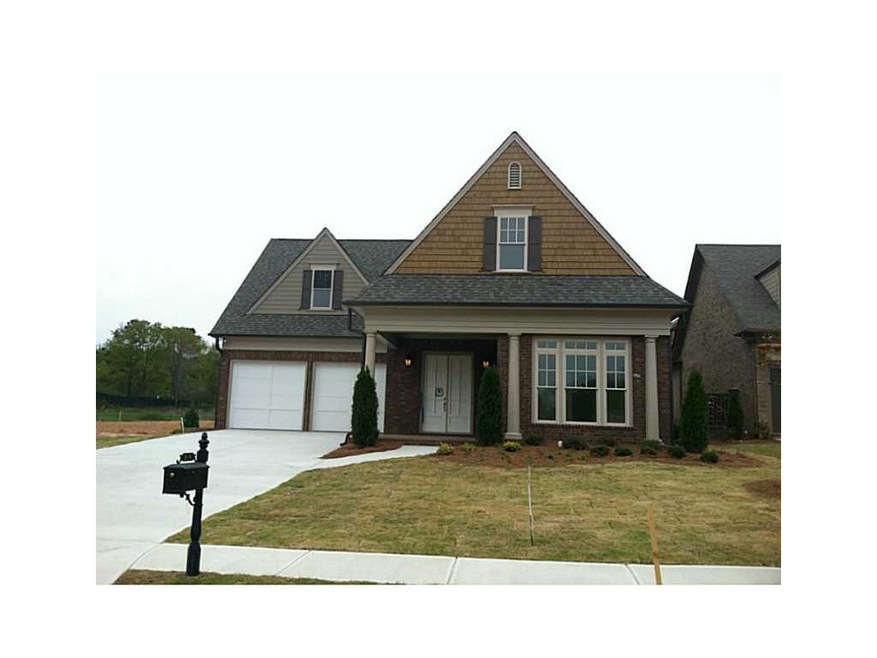 Exterior Front. Personal courtyard off dining room