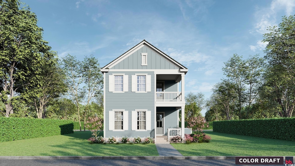 View of front of home featuring a front lawn and a balcony