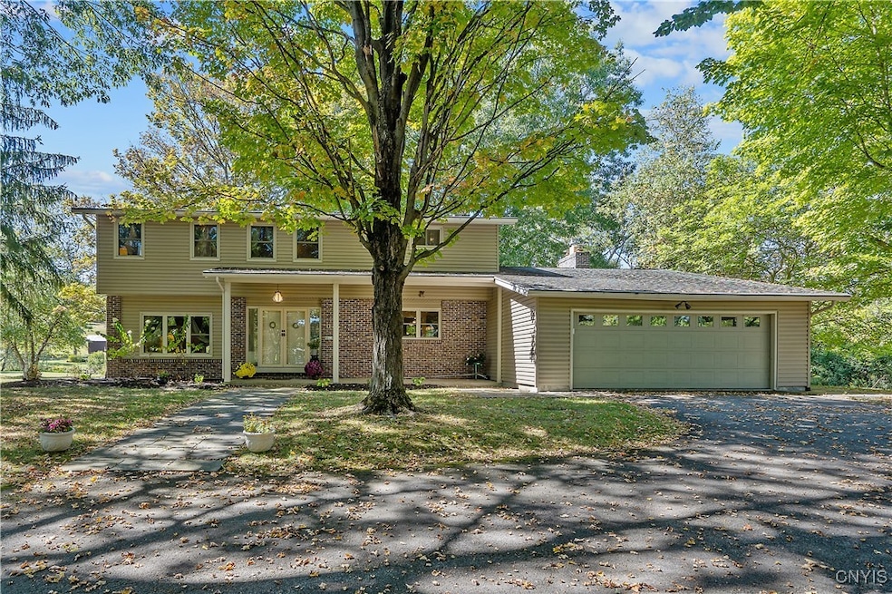 WELCOME TO 4811 BEEF STREET! Driving up the majestic circular drive, you will be welcomed into this fabulous 5 bedroom home situated on 4.1 beautiful acres!