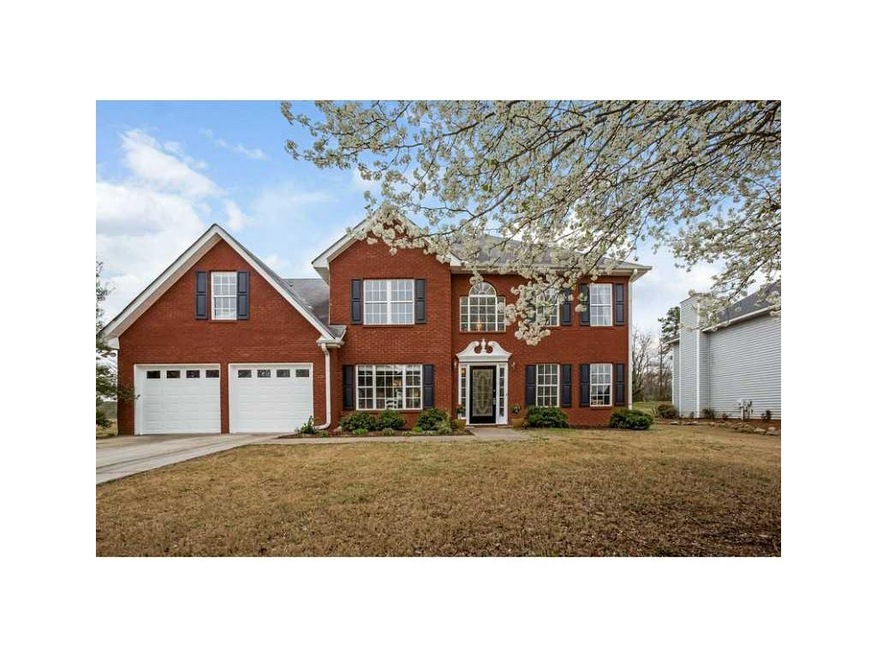 Exterior Front. Brick front on large level lot