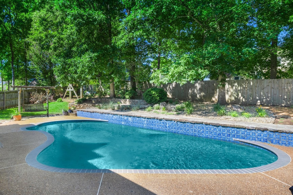 View of pool featuring a fenced backyard