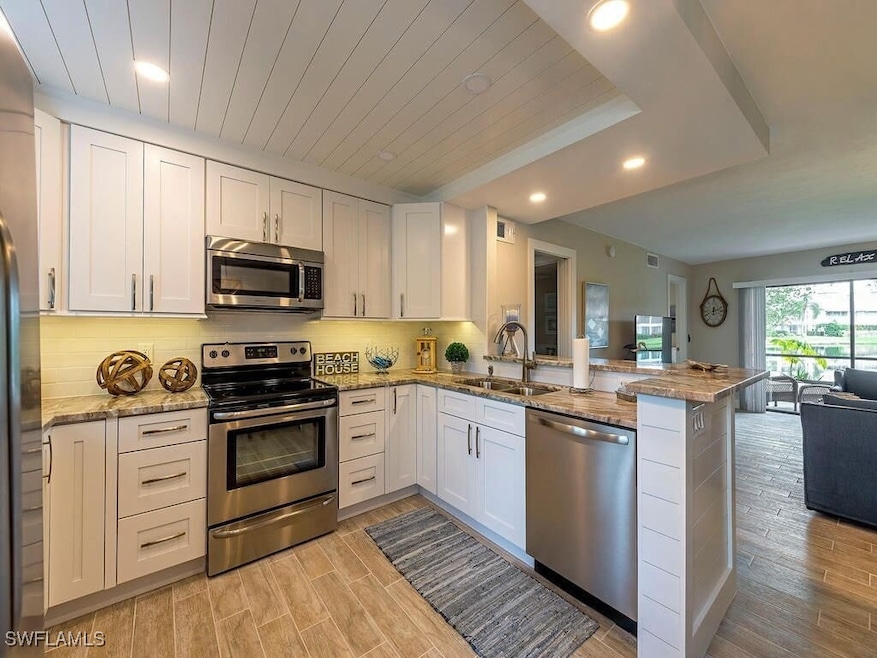 900 Misty Pines Cir unit 203, Naples, FL 34105 - photo 1