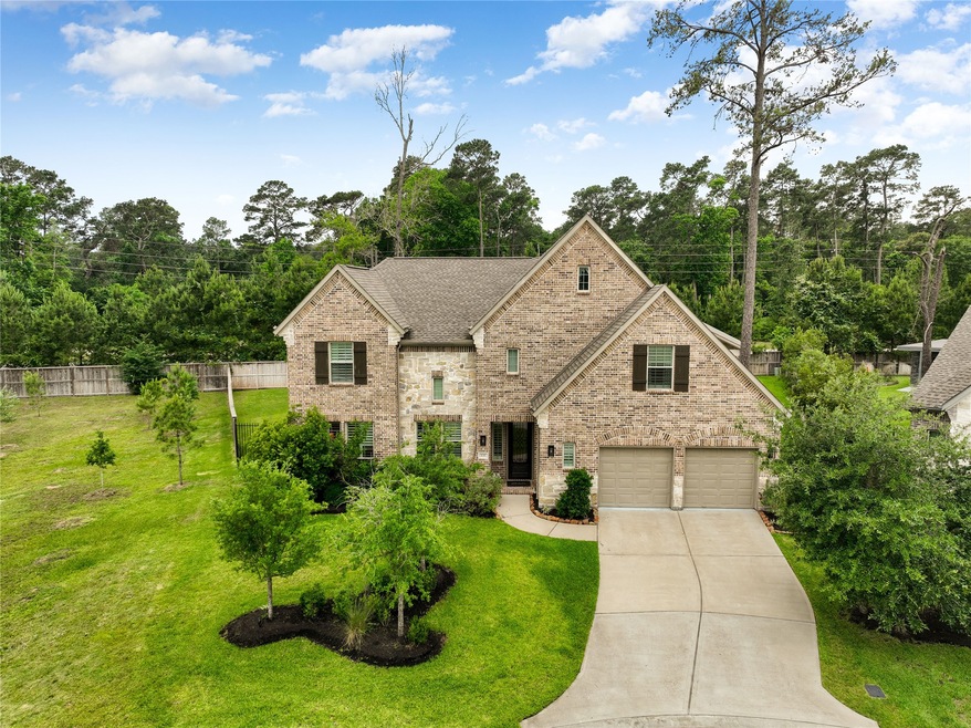 Charming two-story brick home with a spacious driv
