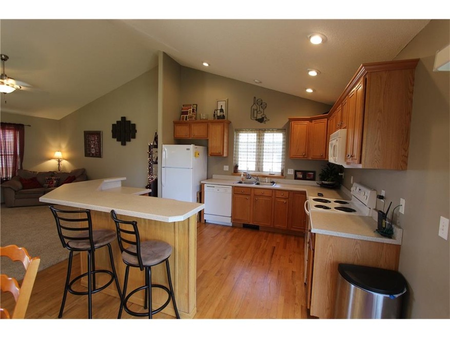 Beautiful neutral colors. Warm wood floors.