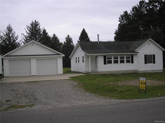 1386 Gun Club Rd home with attached garage with 12