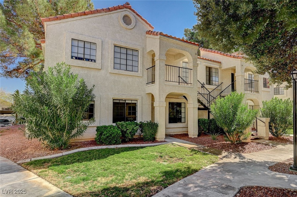Mediterranean / spanish-style home featuring a til