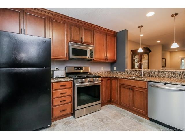 Beautifully remodeled kitchen with tile flooring, 