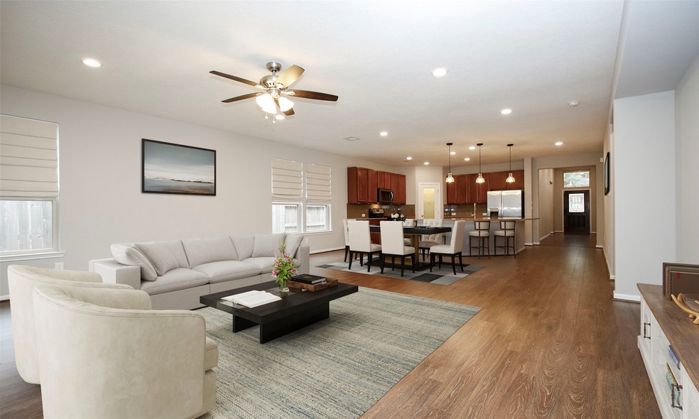 Gorgeous open kitchen/living/dining. Image is virt