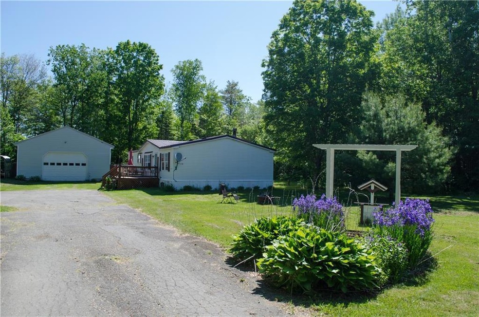 Nicely landscaped home with over 9...