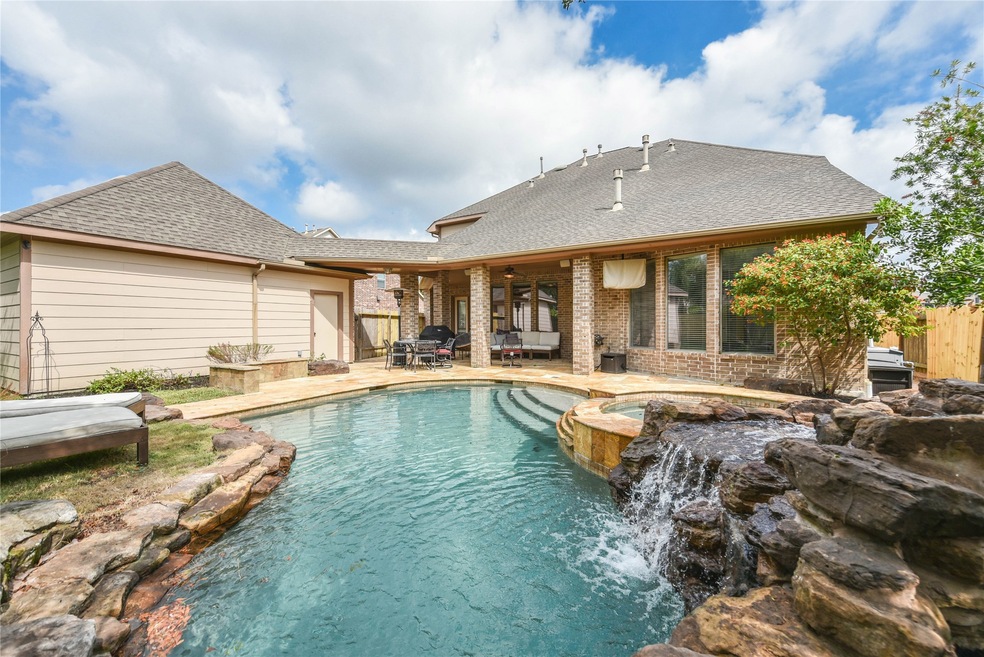 Lush pool area for relaxing and having fun