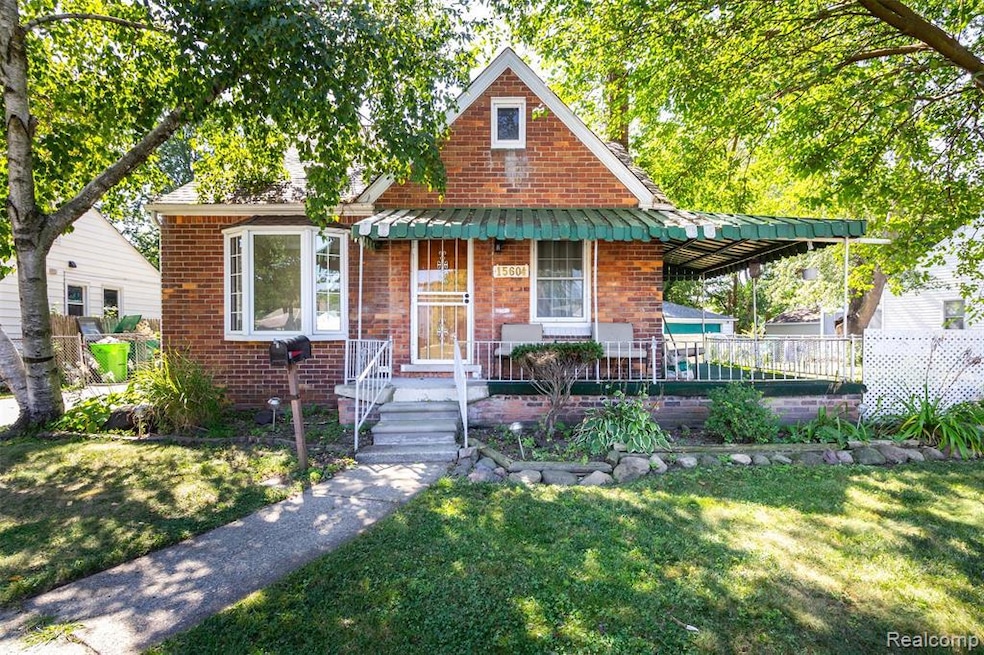 Bungalow-style home with brick siding and a porch