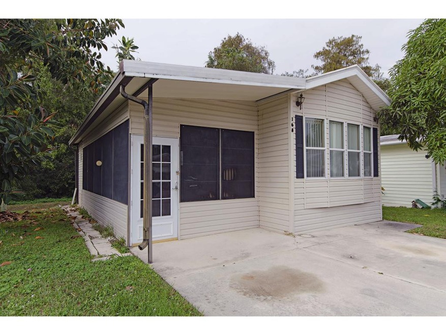 168 Panther Pass Cir, Naples, FL 34109 - photo 1