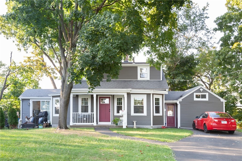 Front exterior and huge front lawn