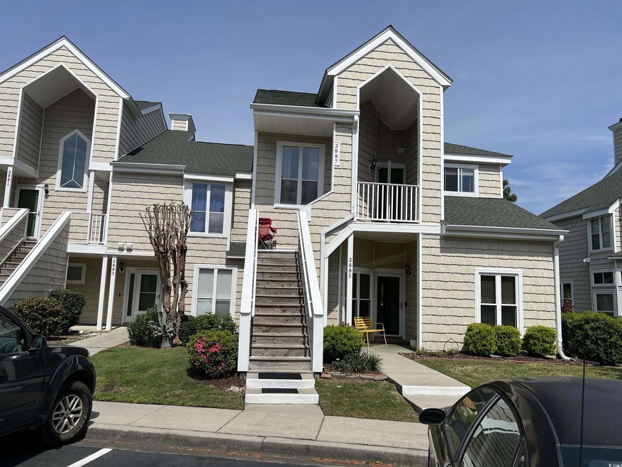View of front of home with a balcony