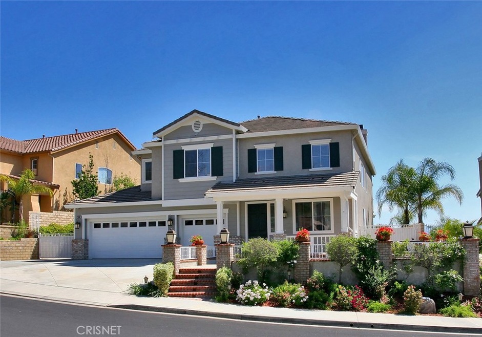 Stunning home with 3 car garage and gated RV parking!