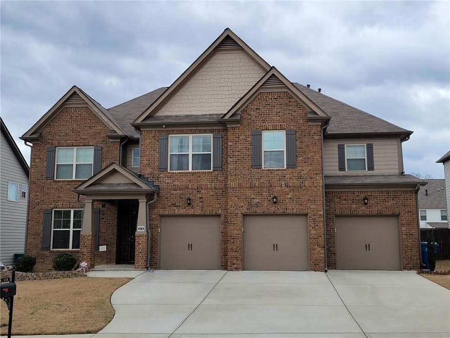 Craftsman-style house featuring a garage