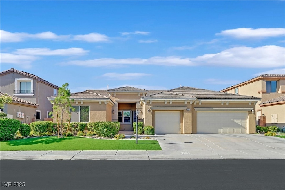View of front of home with a garage, concrete driv