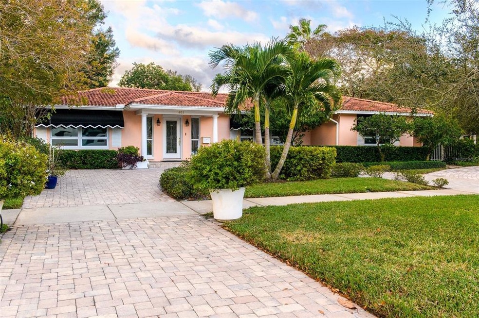 Wide circular driveway and located on a corner lot