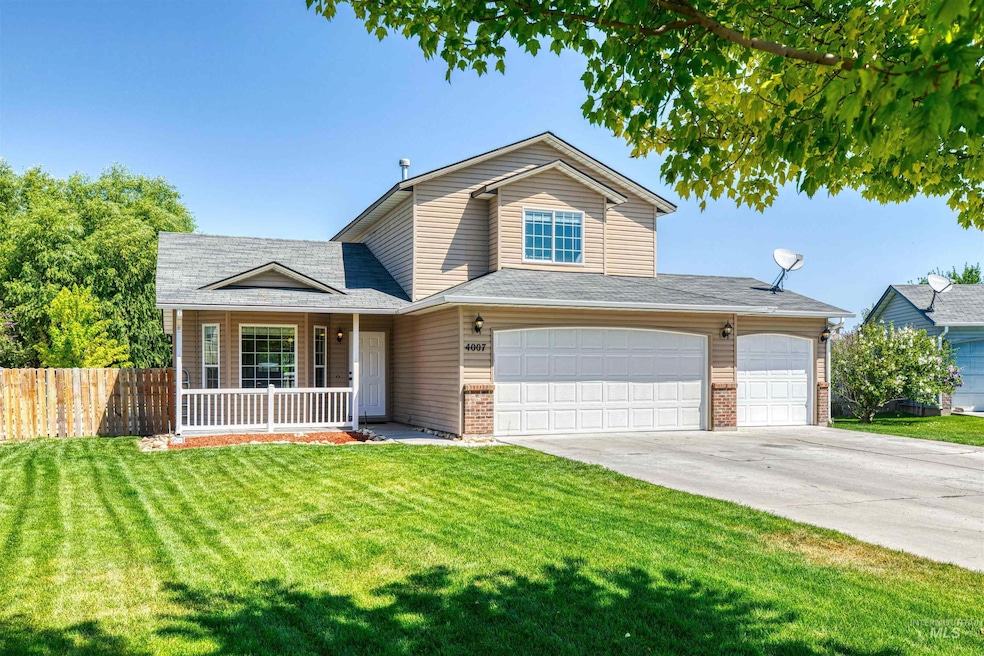 Traditional-style home featuring a porch, concrete driveway, brick siding, a garage, and a shingled roof