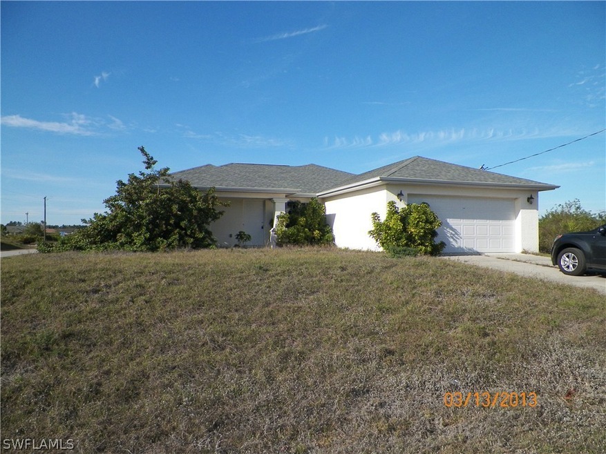 Front of house, corner lot.