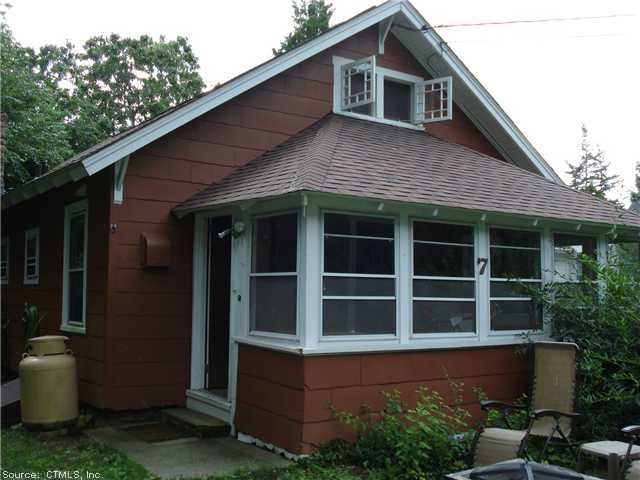 Exterior Front. Calkins Rd. entrance to the house.