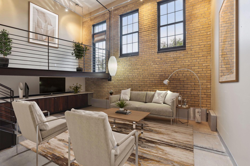 Welcome to 730 Stinson Boulevard #103, a spacious and open main floor unit where modern style meets historic character!* Virtually staged photography.