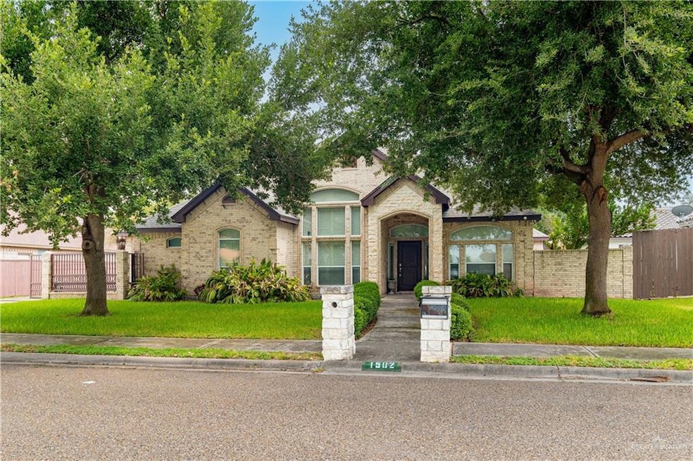 View of front of home featuring brick siding