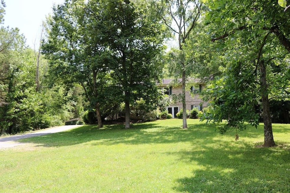 Welcome to 740 Chandler Rd! This solid brick home sits tucked away from the road surrounded by beautiful mature trees.