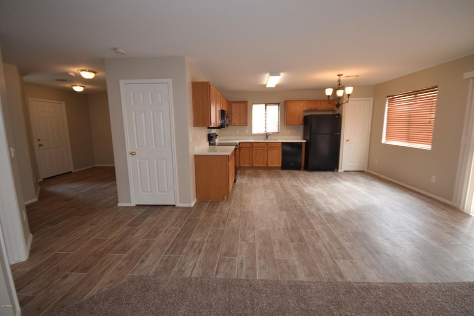 1 - Kitchen & front Entrance View