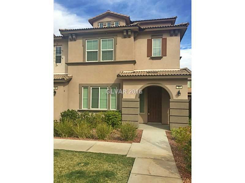 Property Photo. Front of home- end unit with large