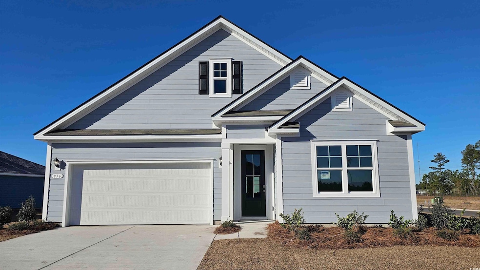 View of front of home featuring driveway