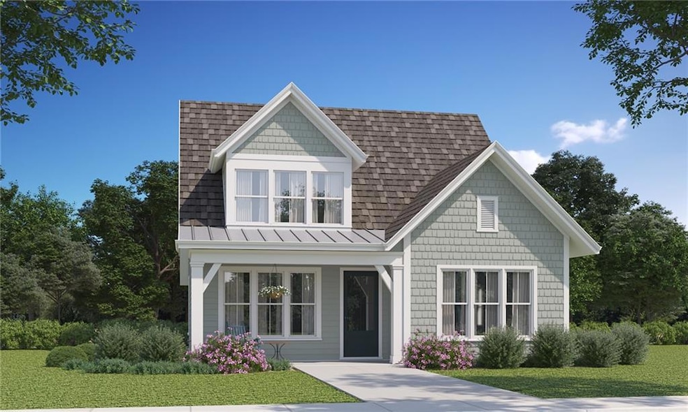 View of front of property with a front lawn