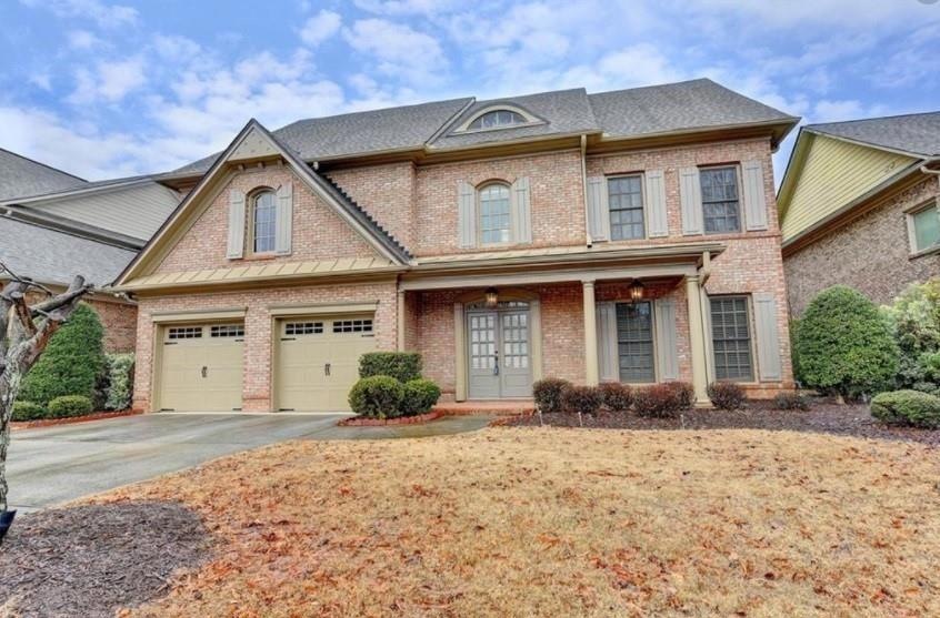View of front of home with a garage