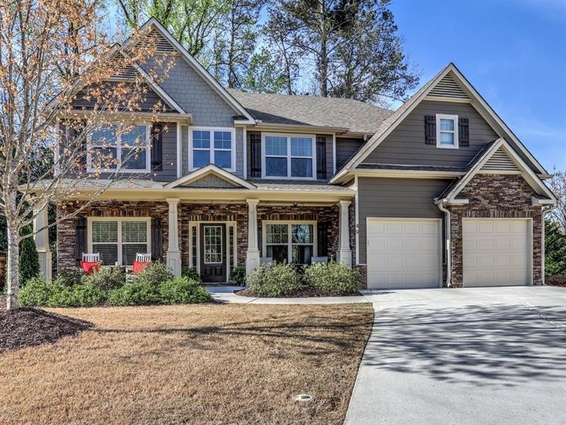 Enjoy this gorgeous rocking chair front porch on a