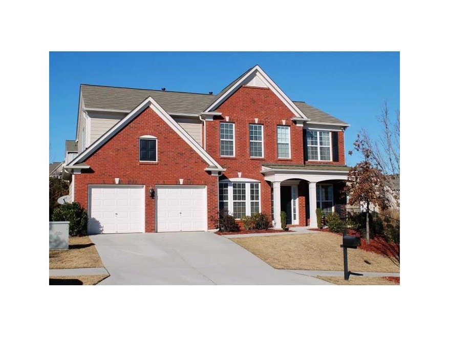 Exterior Front. Inviting Brick Home with Big Flat 